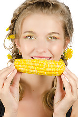 Image showing woman eating corn-cob