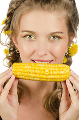 Image showing woman eating corn-cob