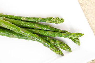 Image showing Fresh asparagus on white