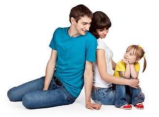 Image showing father, mother and young daughter in jeans