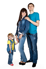 Image showing father, mother and young daughter in jeans