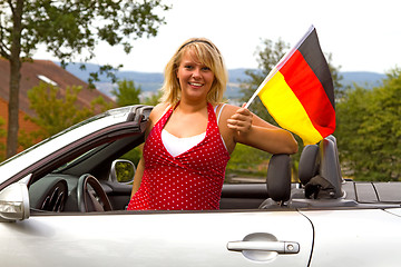 Image showing Young woman with german flag