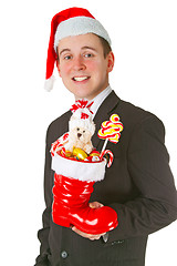 Image showing Business man with a Christmas Stocking