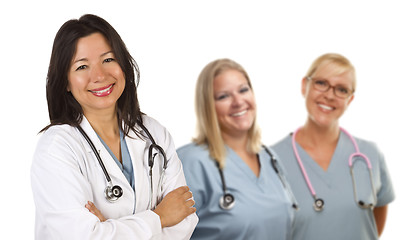 Image showing Hispanic Female Doctor and Colleagues Behind