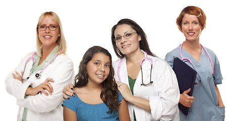 Image showing Hispanic Female Doctor with Child Patient and Colleagues Behind