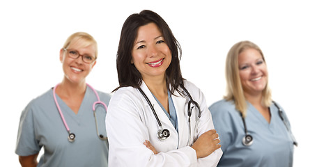 Image showing Hispanic Female Doctor and Colleagues Behind