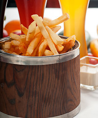 Image showing fresh french fries on a bucket