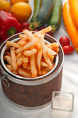 Image showing fresh french fries on a bucket