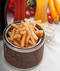 Image showing fresh french fries on a bucket