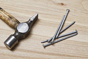 Image showing Old hammer and nails 