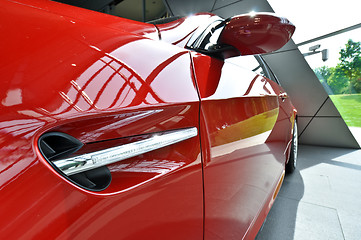 Image showing side of red sports car