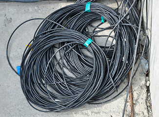 Image showing the coil of black electrical cable