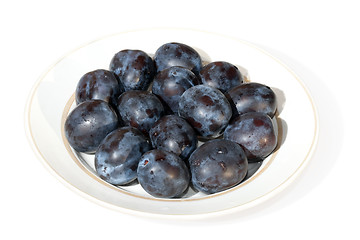 Image showing Ripe plums on a plate