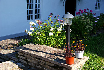 Image showing Flowers on the porch