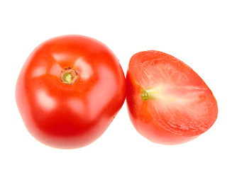 Image showing Group of one cross and full ripe red tomatoes