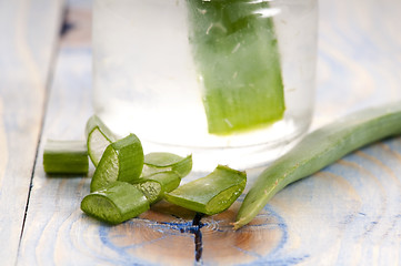 Image showing aloe vera juice with fresh leaves