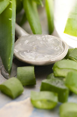 Image showing aloe vera juice with fresh leaves