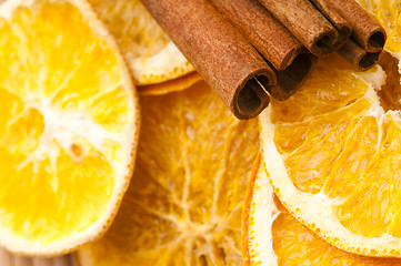 Image showing Dried orange and cinnamon sticks - christmas decoration