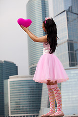 Image showing girl doll in Big City