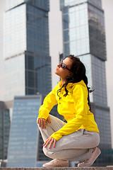 Image showing brunette in a yellow blazer