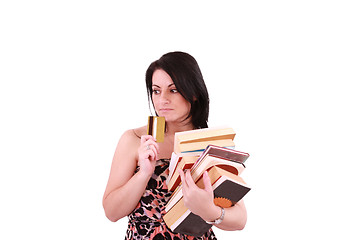 Image showing young woman paying high bills with credit card