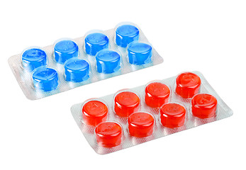 Image showing Two metallic blister with red and blue pills