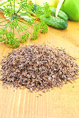 Image showing Dill seeds on the plank