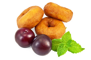 Image showing Doughnuts with mint and plums