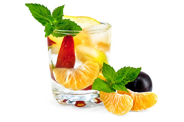 Image showing Fruit cocktail in a glass with plums