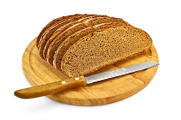 Image showing Rye bread on a round board with a knife