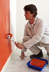 Image showing Painting a wall