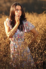 Image showing Beautiful Woman on a Field in Summertime 