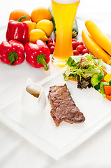 Image showing juicy BBQ grilled rib eye ,ribeye steak and vegetables