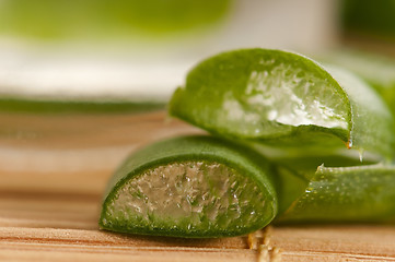 Image showing aloe vera juice with fresh leaves