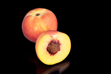 Image showing Two peaches