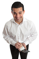 Image showing Happy businessman, waiter etc with pen and notepad