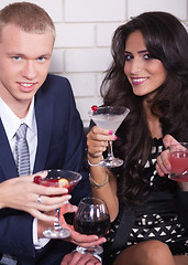 Image showing Couple on date in bar or night club enjoying wine