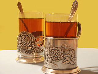 Image showing glasses in coasters for tea