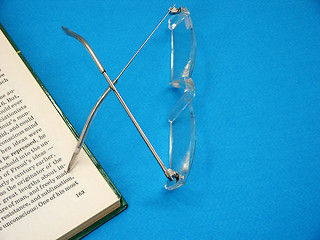 Image showing glasses and the book