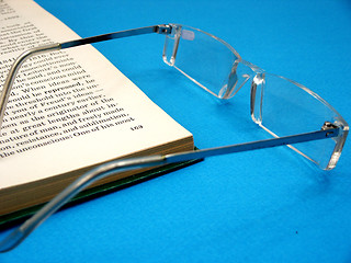 Image showing glasses and the book