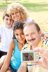 Image showing Happy family taking self portrait