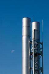 Image showing Two metal chimneys