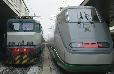 Image showing Two generations of trains