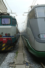 Image showing Two generations of trains