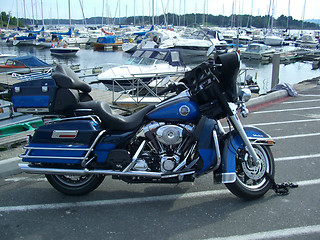 Image showing motobike and boats