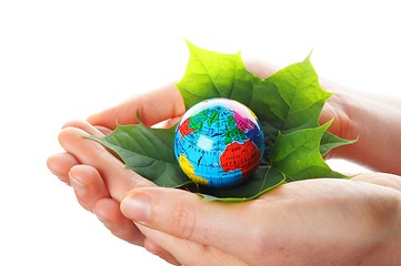 Image showing hand holding globe