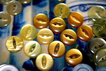 Image showing yellow buttons