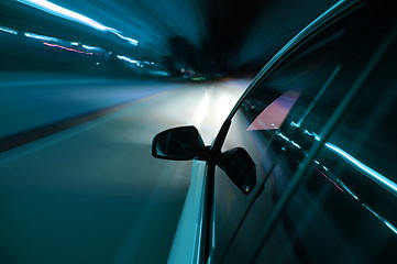 Image showing night drive with car in motion 