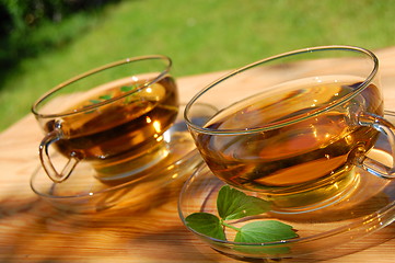 Image showing cup of tea in the garden