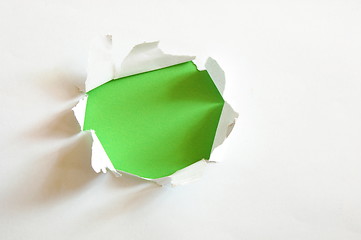 Image showing green hole in blank sheet paper